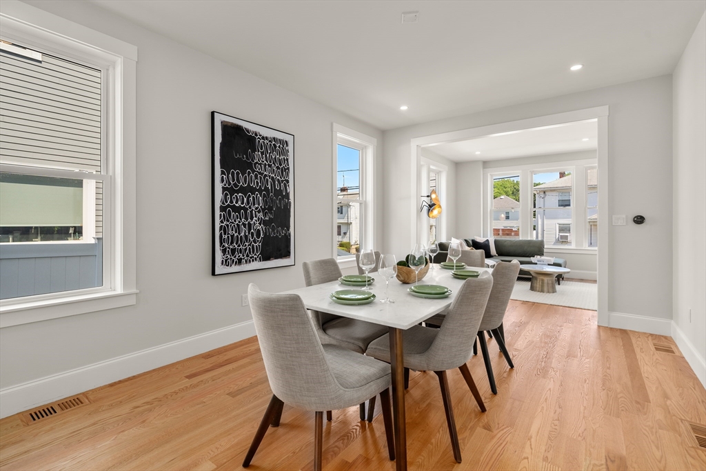 48 Hamilton Road Belmont, MA 02478 - Photo 8 of 35 a view of a dining room with furniture and wooden floor