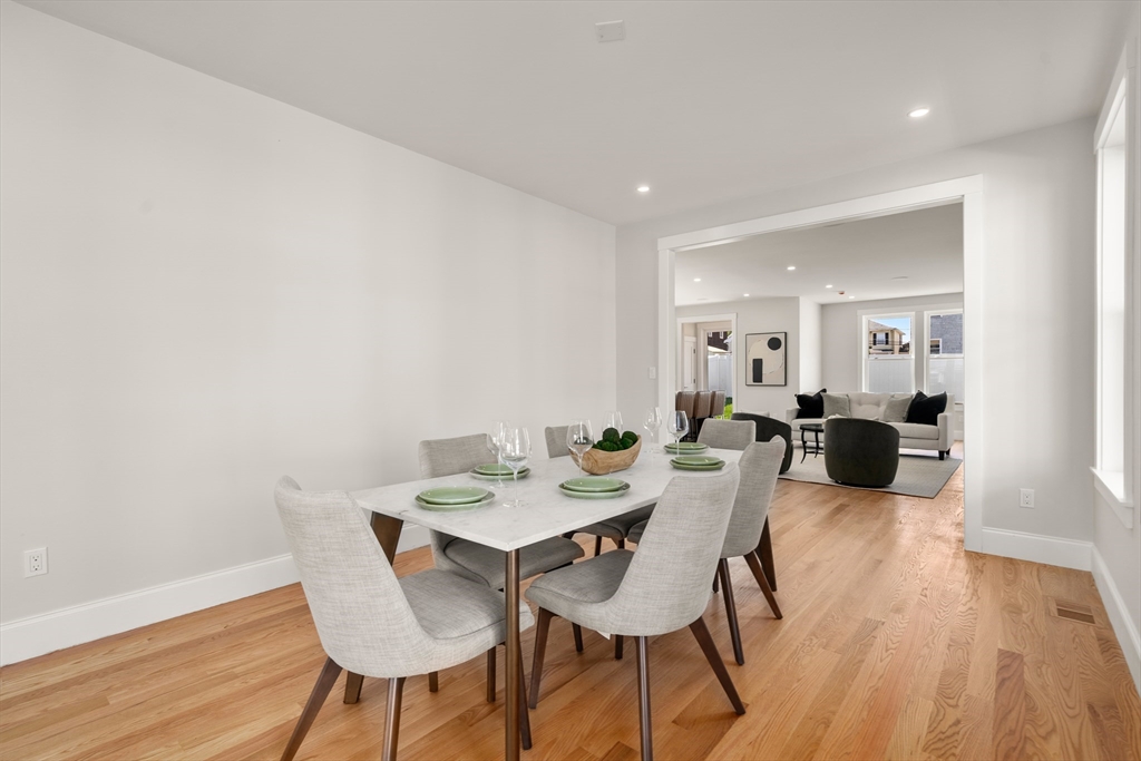 48 Hamilton Road Belmont, MA 02478 - Photo 9 of 35 a view of a dining room with furniture and wooden floor