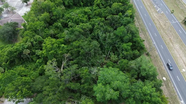 an outdoor view of house with green space