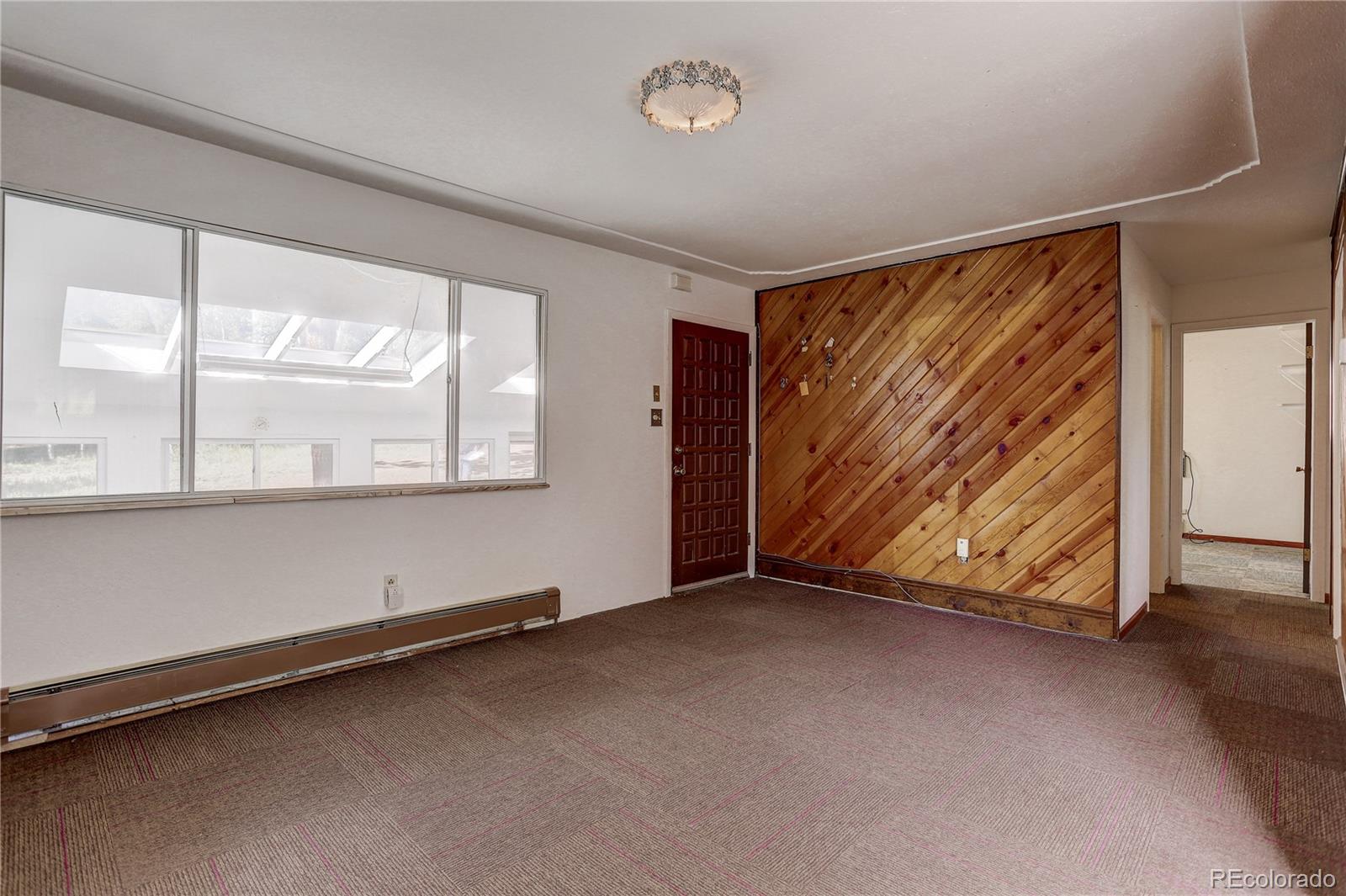 191 Anderson Road Bailey, CO 80421 - Photo 11 of 38 an empty room with window