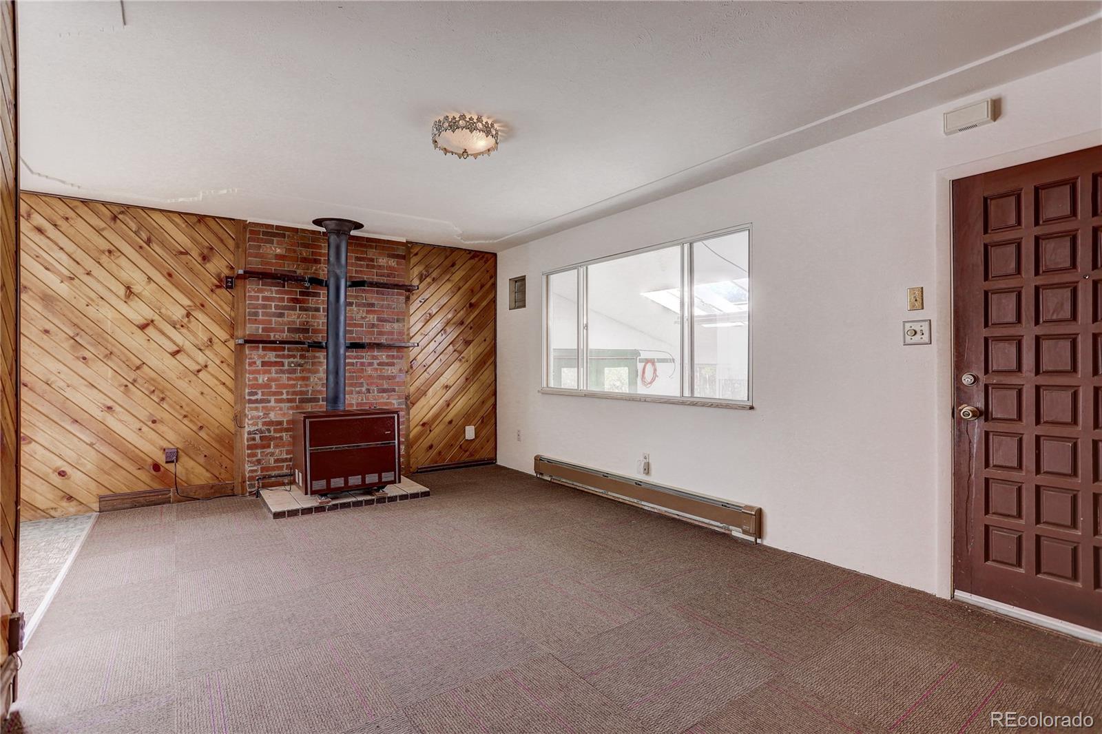 191 Anderson Road Bailey, CO 80421 - Photo 12 of 38 a view of room with hardwood