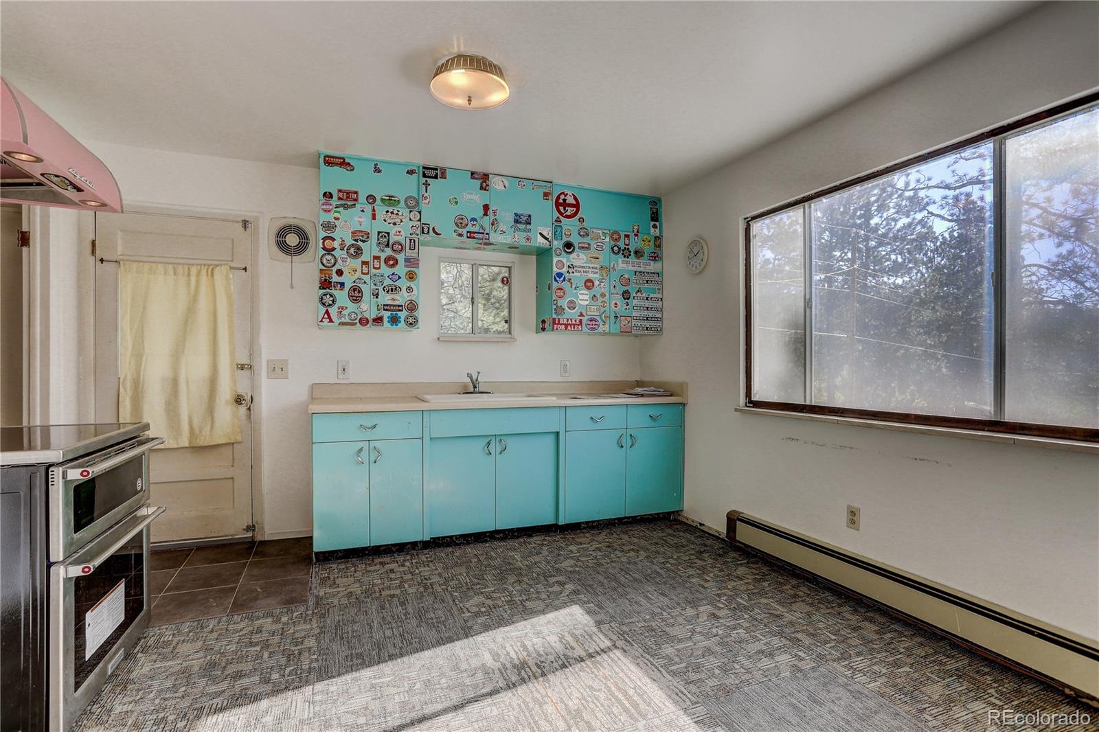 191 Anderson Road Bailey, CO 80421 - Photo 15 of 38 a room with painting and a large window