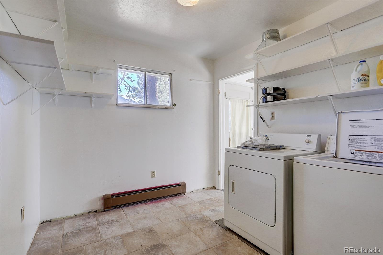 191 Anderson Road Bailey, CO 80421 - Photo 19 of 38 a view of a storage & utility room with a sink