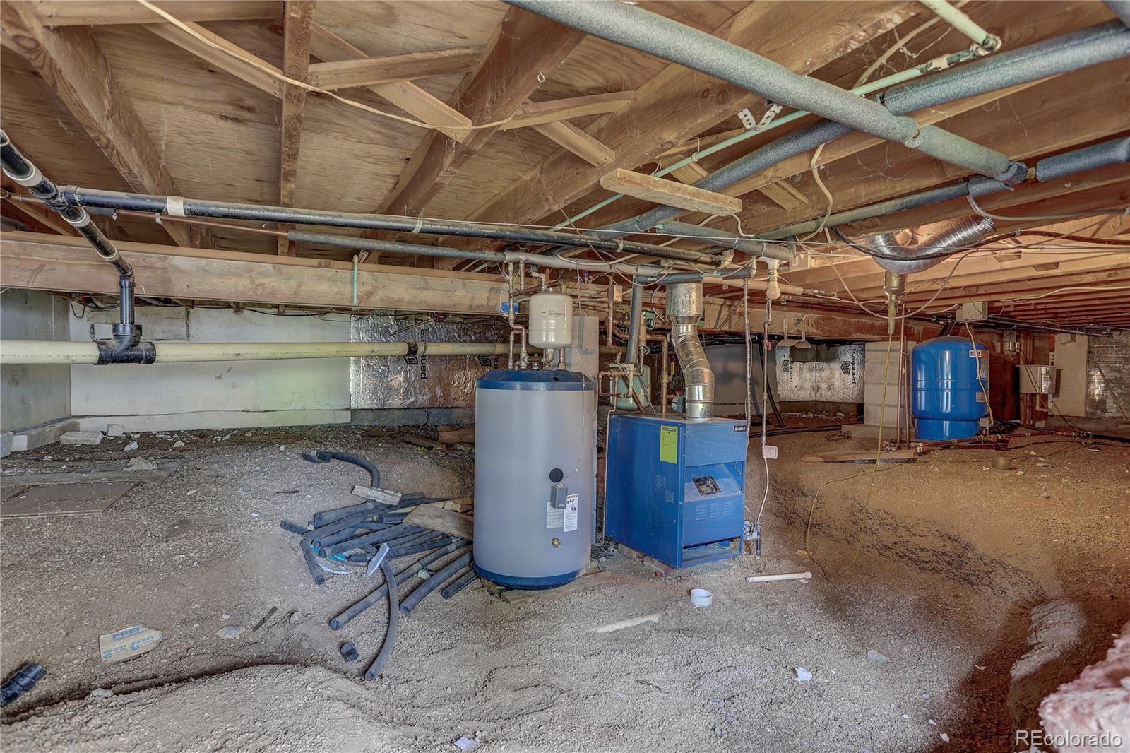 191 Anderson Road Bailey, CO 80421 - Photo 26 of 38 a view of a storage room with racks