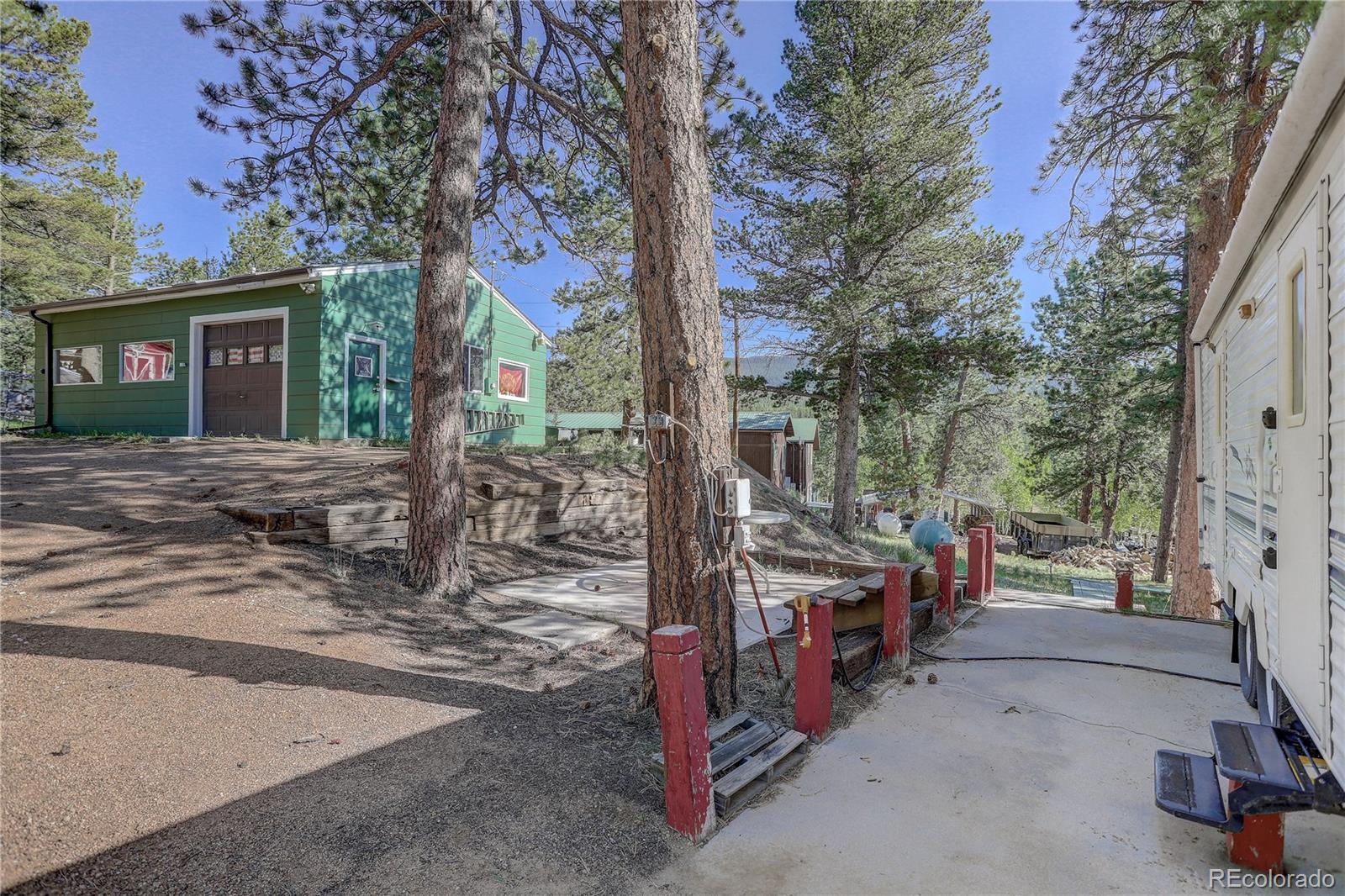 191 Anderson Road Bailey, CO 80421 - Photo 27 of 38 a view of a park with trees in the house