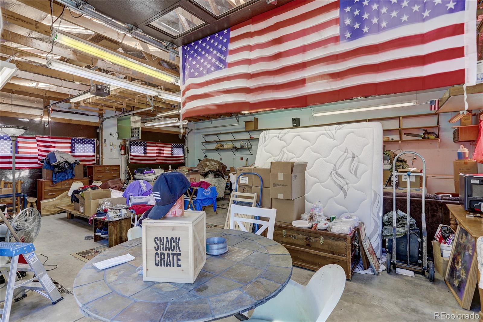191 Anderson Road Bailey, CO 80421 - Photo 29 of 38 a view of a storage room with a lot of stuff