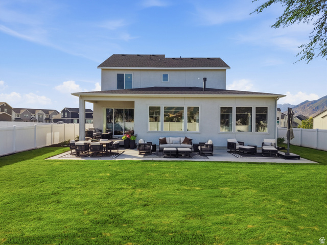 2559 West Aurora Avenue Mapleton, UT 84664 - Photo 60 of 60 Expansive green lawn with a white vinyl privacy fence