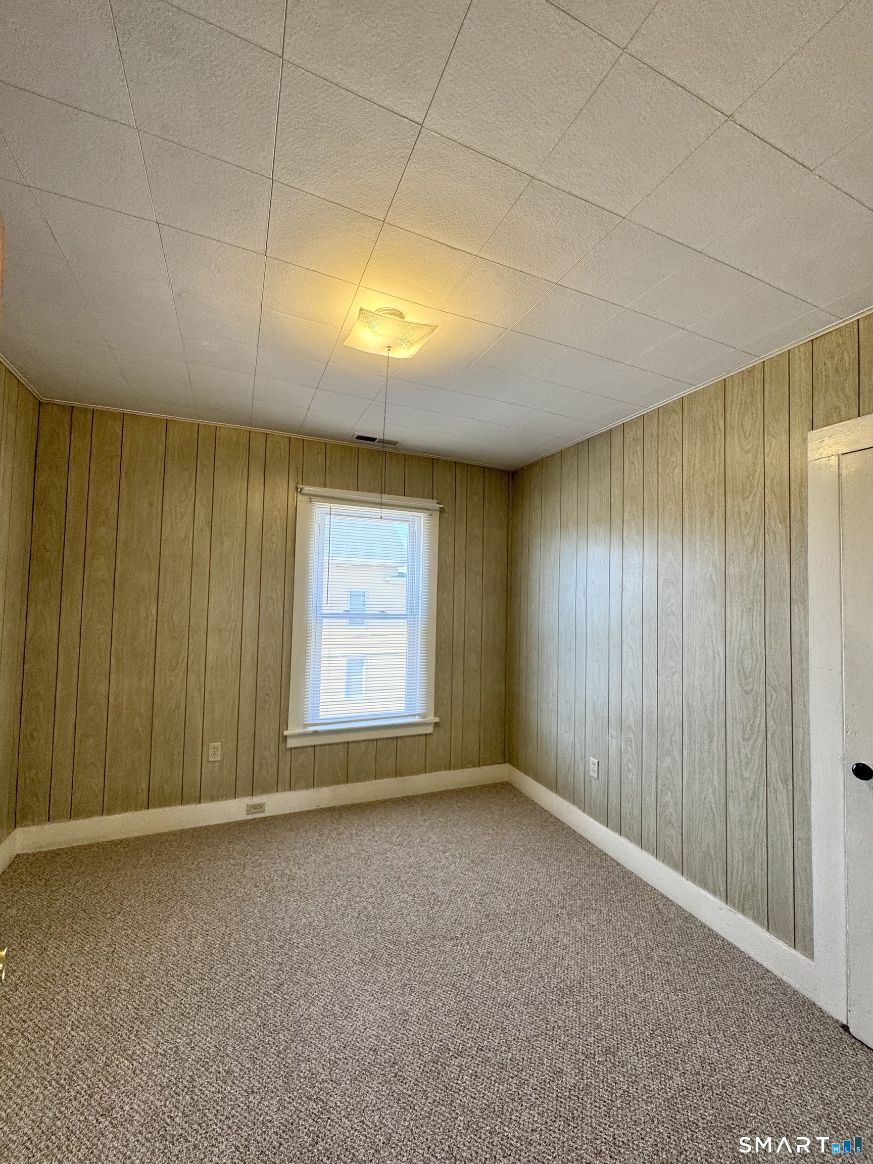 254 Ward Street, Unit 2 Wallingford, CT 06492 - Photo 12 of 28 an empty room with a empty space and windows