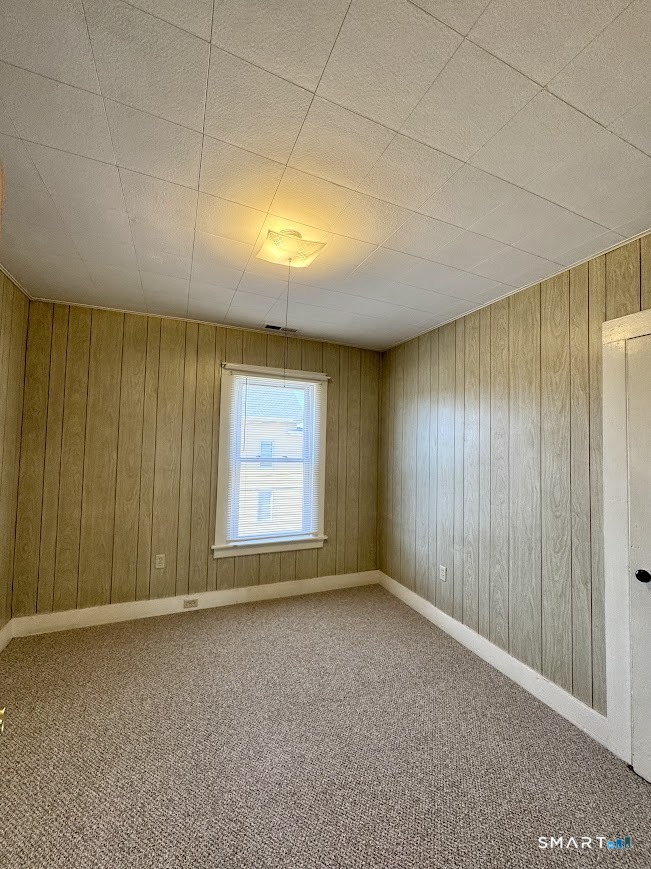 254 Ward Street, Unit 2 Wallingford, CT 06492 - Photo 15 of 28 an empty room with a empty space and windows