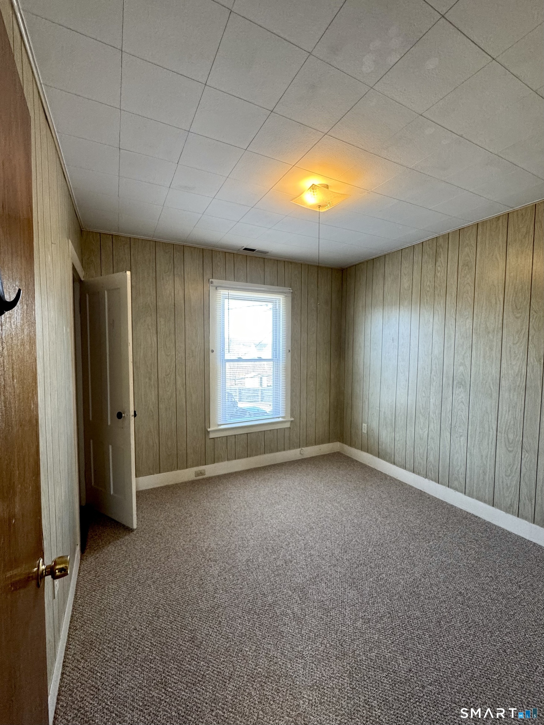 254 Ward Street, Unit 2 Wallingford, CT 06492 - Photo 16 of 28 an empty room with windows
