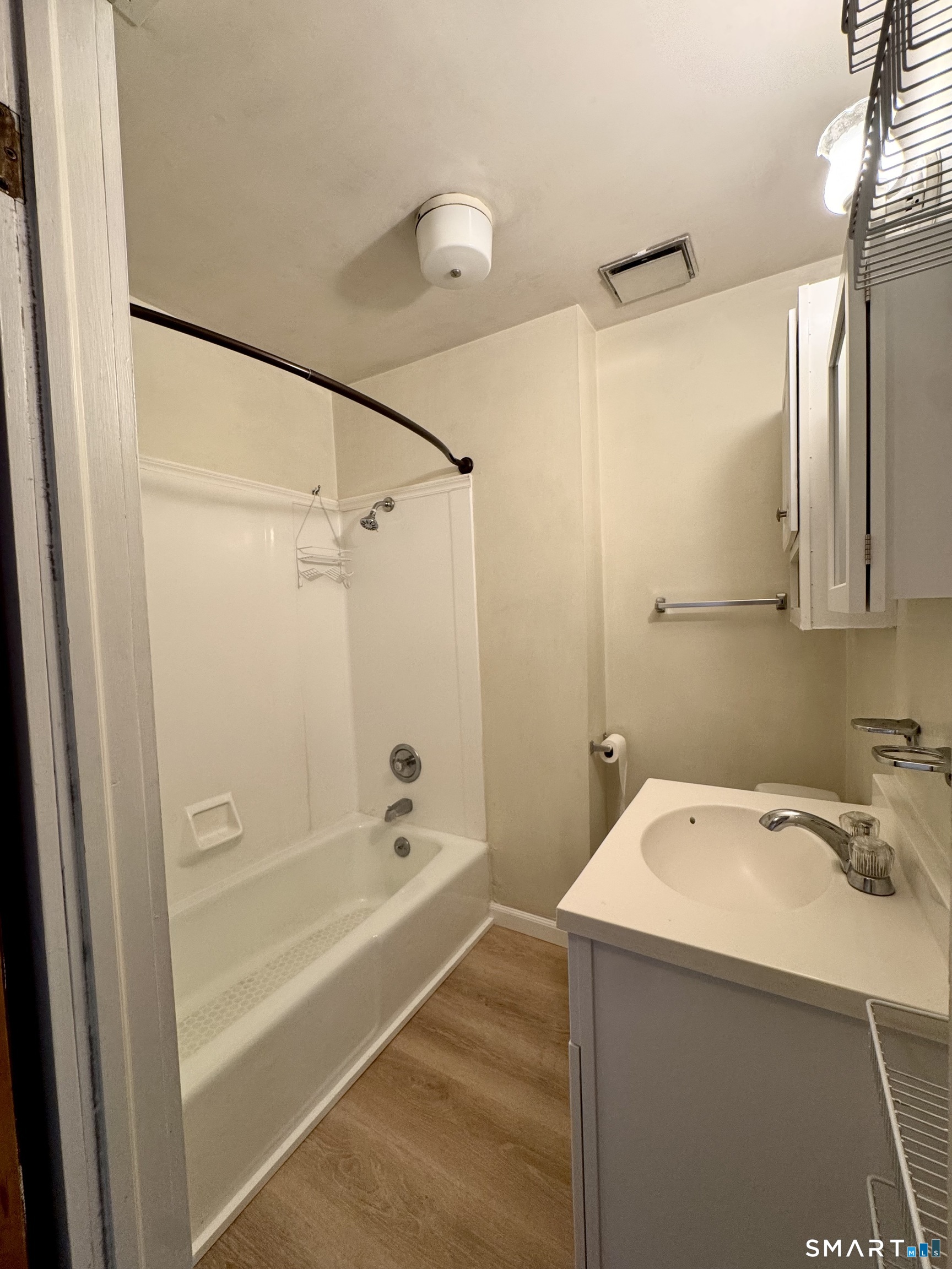 254 Ward Street, Unit 2 Wallingford, CT 06492 - Photo 18 of 28 a bathroom with a sink and a bathtub