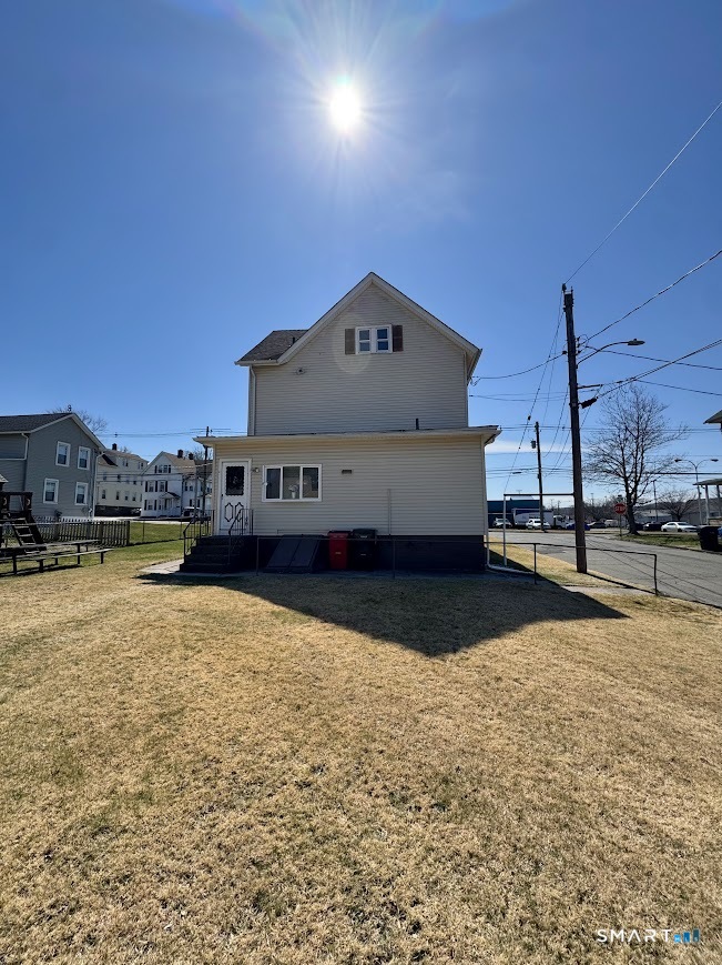 254 Ward Street, Unit 2 Wallingford, CT 06492 - Photo 27 of 28 a view of a house with a yard
