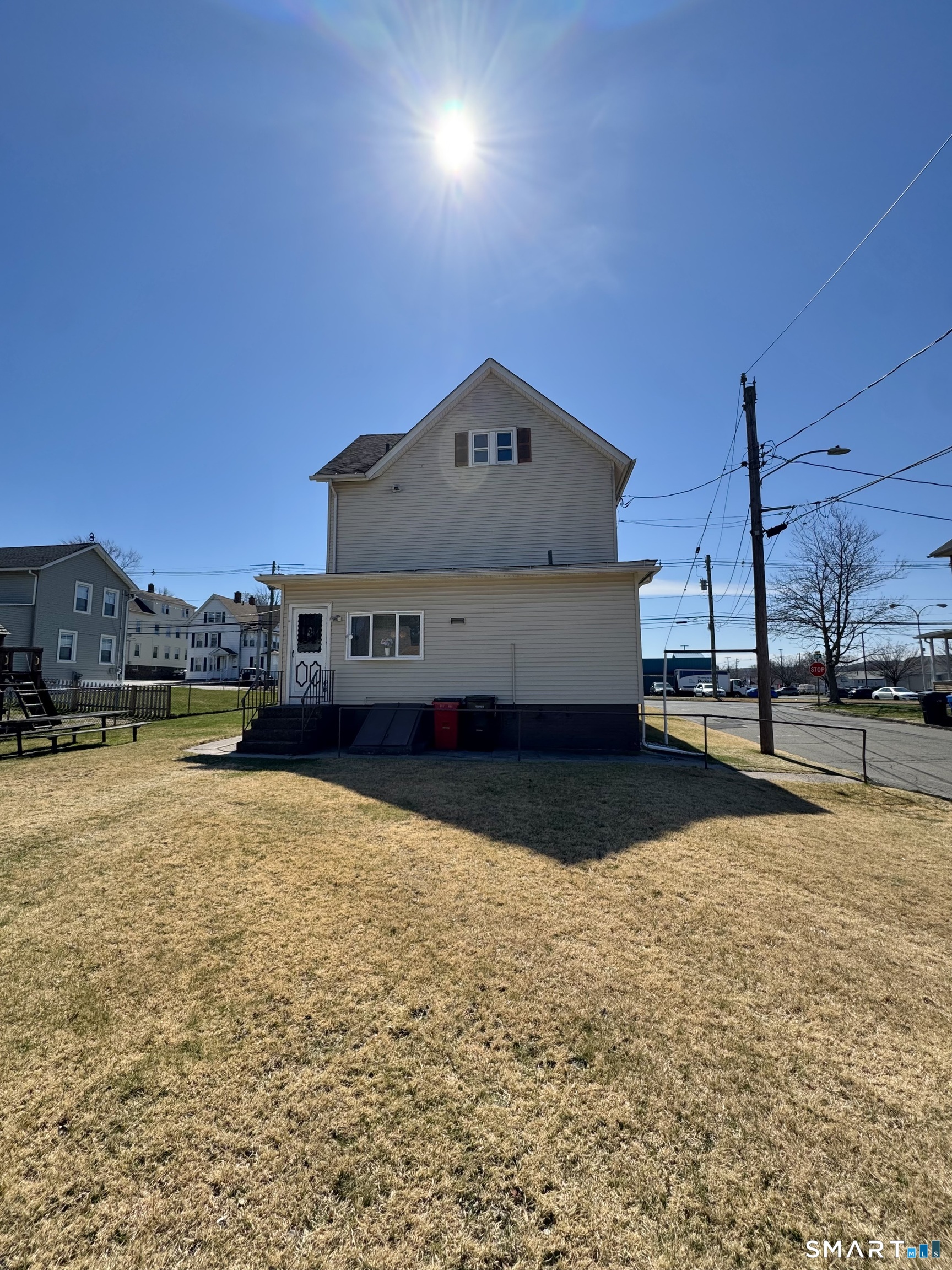 254 Ward Street, Unit 2 Wallingford, CT 06492 - Photo 28 of 28 a view of a house with a yard