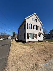 254 Ward Street, Unit 2 Wallingford, CT 06492 - Photo 3 of 28 a view of a house with a yard