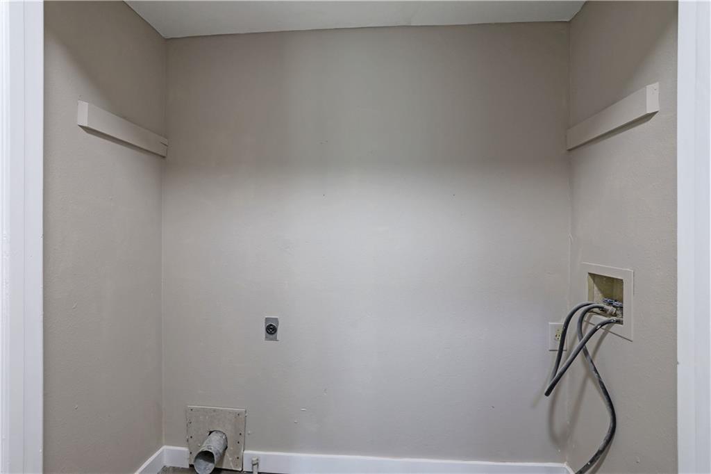 4913 Windsor Downs Drive Decatur, GA 30035 - Photo 22 of 26 a bathroom with a bathtub