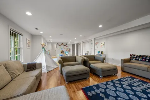 a living room with furniture and a couch