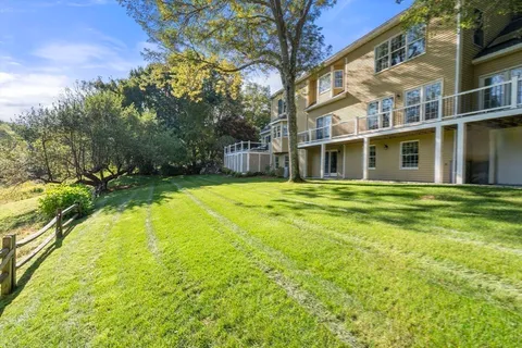 a view of a house with a swimming pool