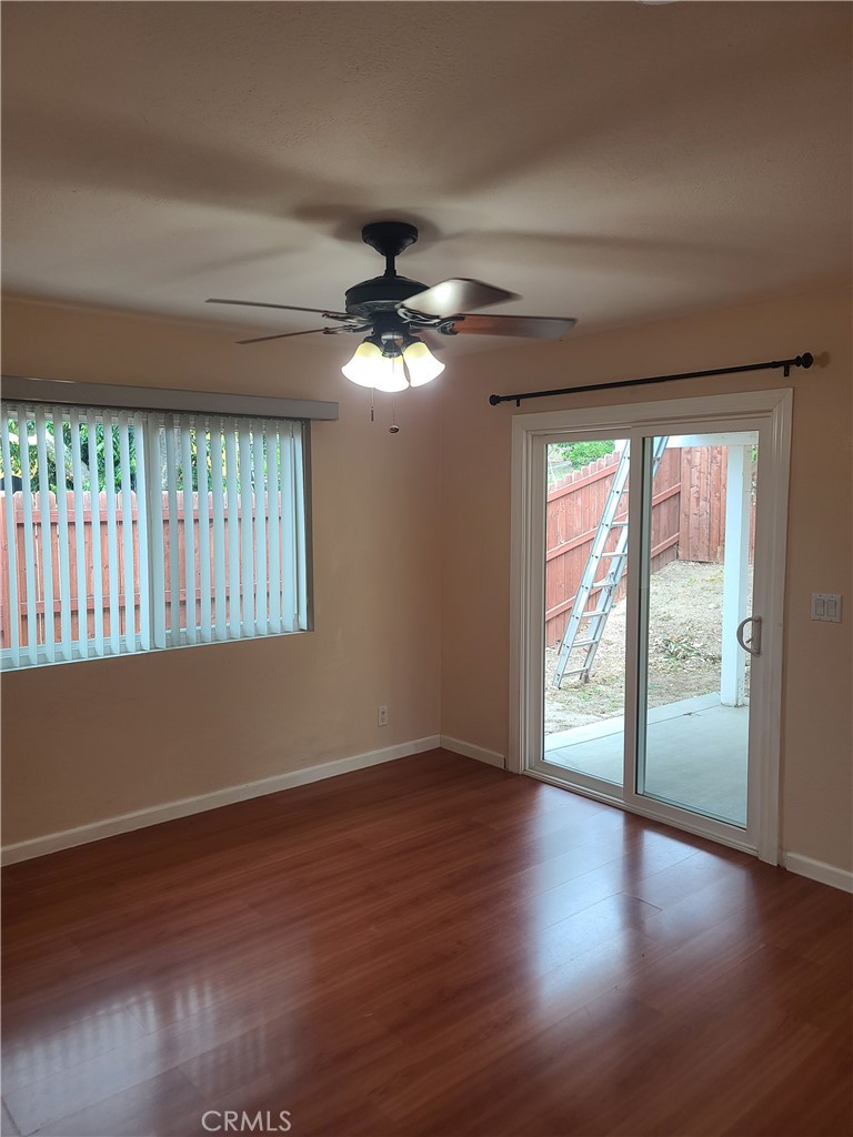 Undisclosed Address Simi Valley, CA 93063 - Photo 14 of 17 a view of an empty room with wooden floor and a window