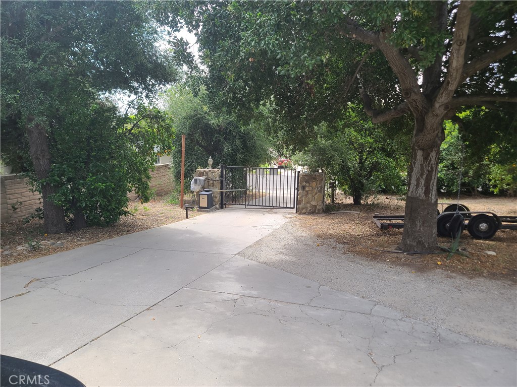 Undisclosed Address Simi Valley, CA 93063 - Photo 5 of 17 a view of street with parked cars