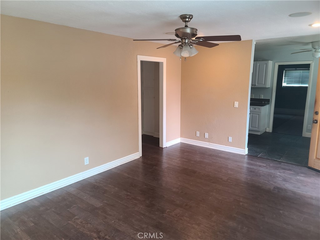Undisclosed Address Simi Valley, CA 93063 - Photo 7 of 17 a view of a room with a empty space and a ceiling fan