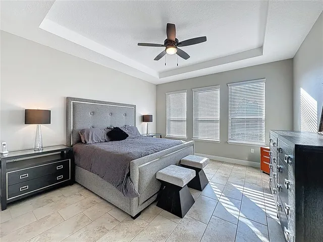 a view of a swimming pool and lounge chair
