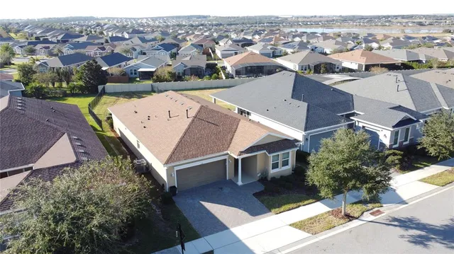 a view of a lake with a house in the background