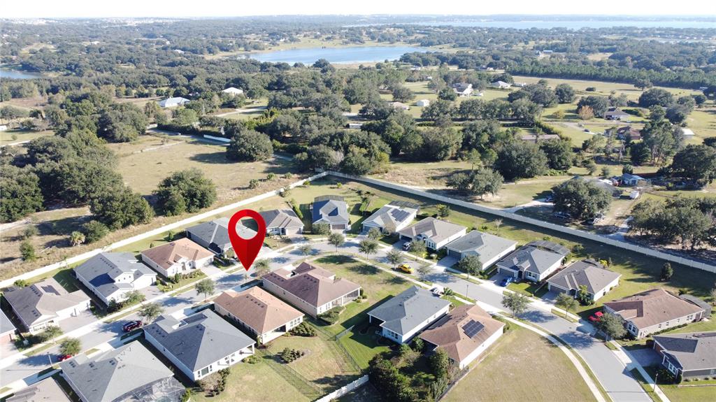 115 Silver Maple Road Groveland, FL 34736 - Photo 60 of 79 an aerial view of residential house with outdoor space
