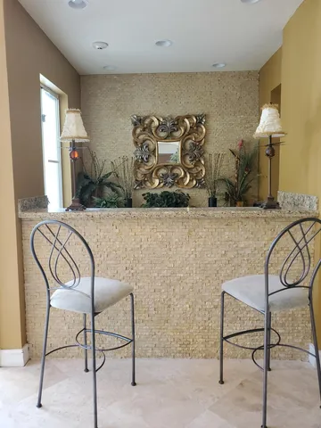 a front view of a house with entertaining space