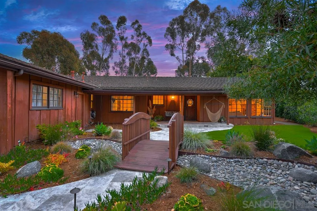 133 Hummingbird Hill Encinitas, CA 92024 - Photo 3 of 25 a front view of a house with garden