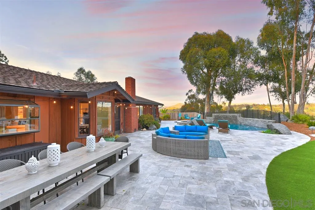 133 Hummingbird Hill Encinitas, CA 92024 - Photo 9 of 25 a outdoor space with the couches and a potted plant