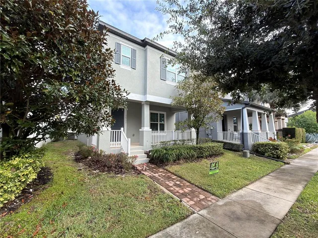 front view of a house with a yard