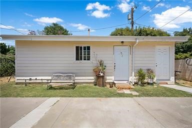 front view of house with a yard