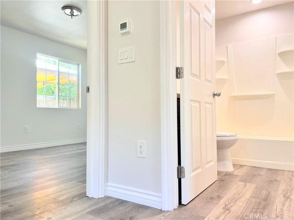 20009 Arminta Street Winnetka, CA 91306 - Photo 11 of 29 a view of a bathroom with a tub and shower