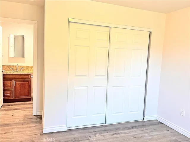 a bathroom with a shower and a toilet