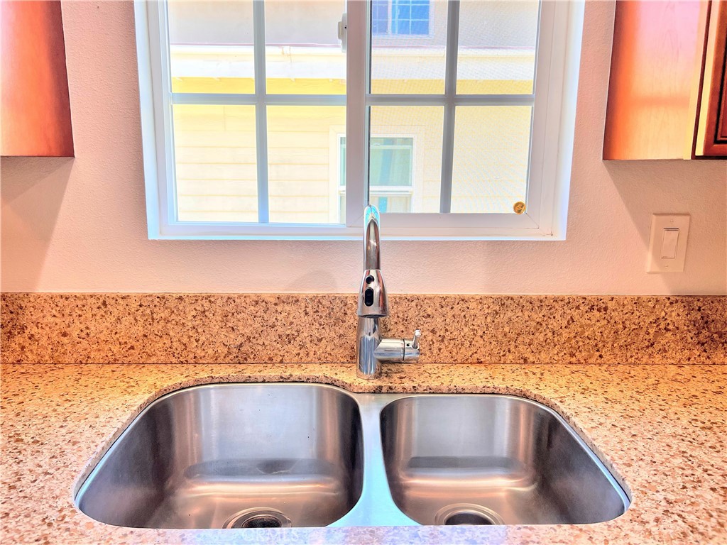 20009 Arminta Street Winnetka, CA 91306 - Photo 8 of 29 a bathroom sink with a bathtub