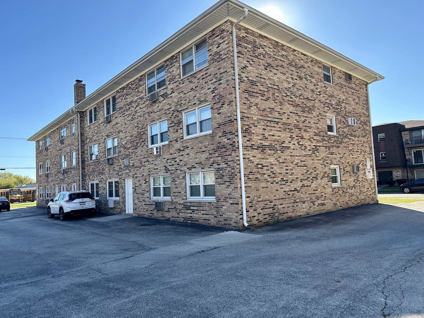 7008 O'Connell Drive, Unit 201 Chicago Ridge, IL 60415 - Photo 17 of 21 a view of building with car parked