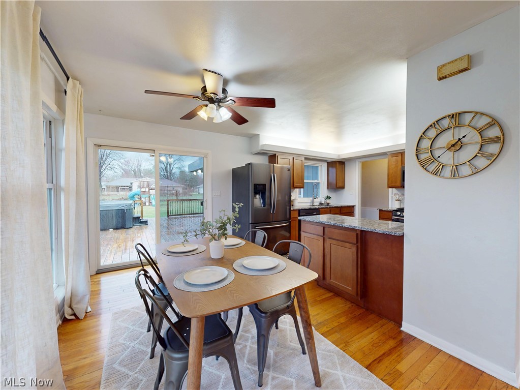 162 South Leavitt Road Amherst, OH 44001 - Photo 6 of 41 Dining room with light wood-type flooring and ceiling fan
