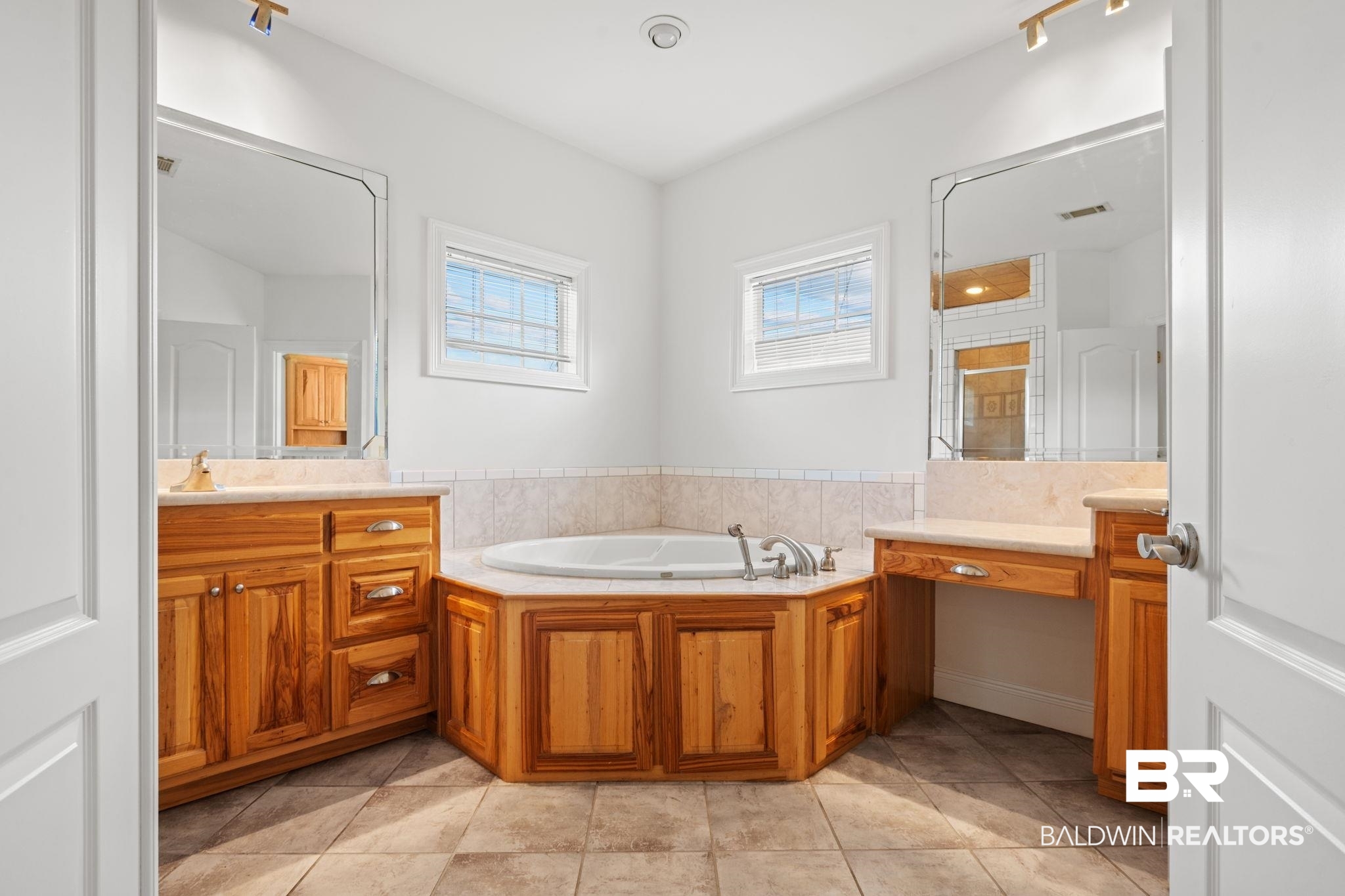 29634 St George Street Daphne, AL 36526 - Photo 31 of 47 Full bath featuring vanity, a bath, light tile patterned flooring, and a shower stall