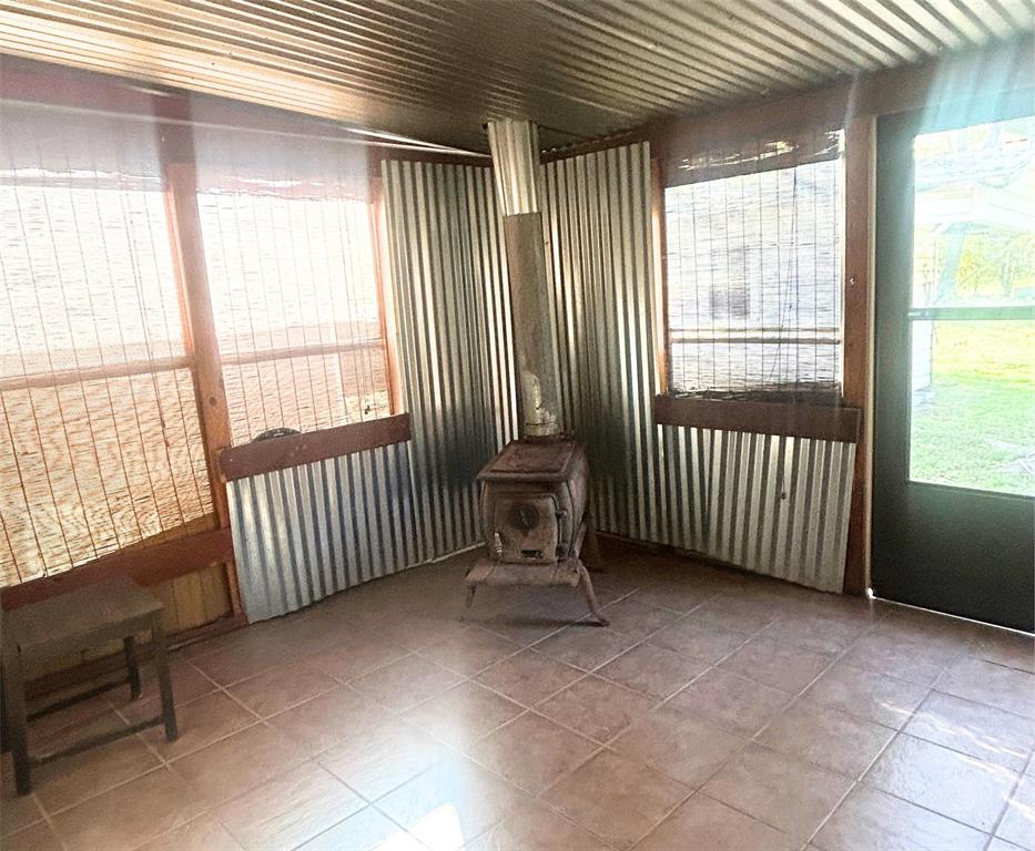 2609 Washington Street Commerce, TX 75428 - Photo 19 of 20 a view of an empty room with a window