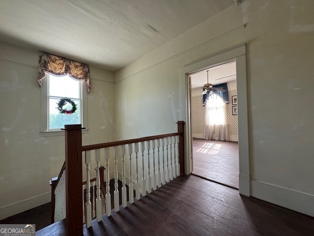 222 Church Street Lexington, GA 30648 - Photo 32 of 50 a view of a hallway with wooden floor and stairs