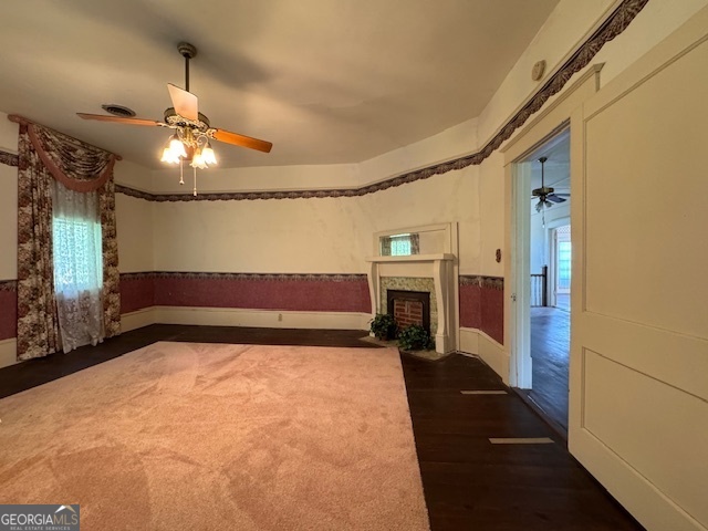 222 Church Street Lexington, GA 30648 - Photo 36 of 50 a view of a livingroom with fireplace and chandelier fan