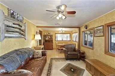 a living room with furniture and a couch