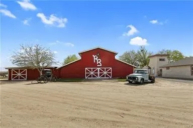 a view of a car in front of a house