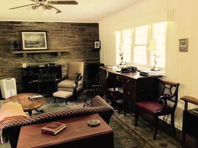544 Kennerly Road Sewanee, TN 37375 - Photo 1 of 11 Large living room with fireplace. Entrance is from the front porch as well as the dining room.