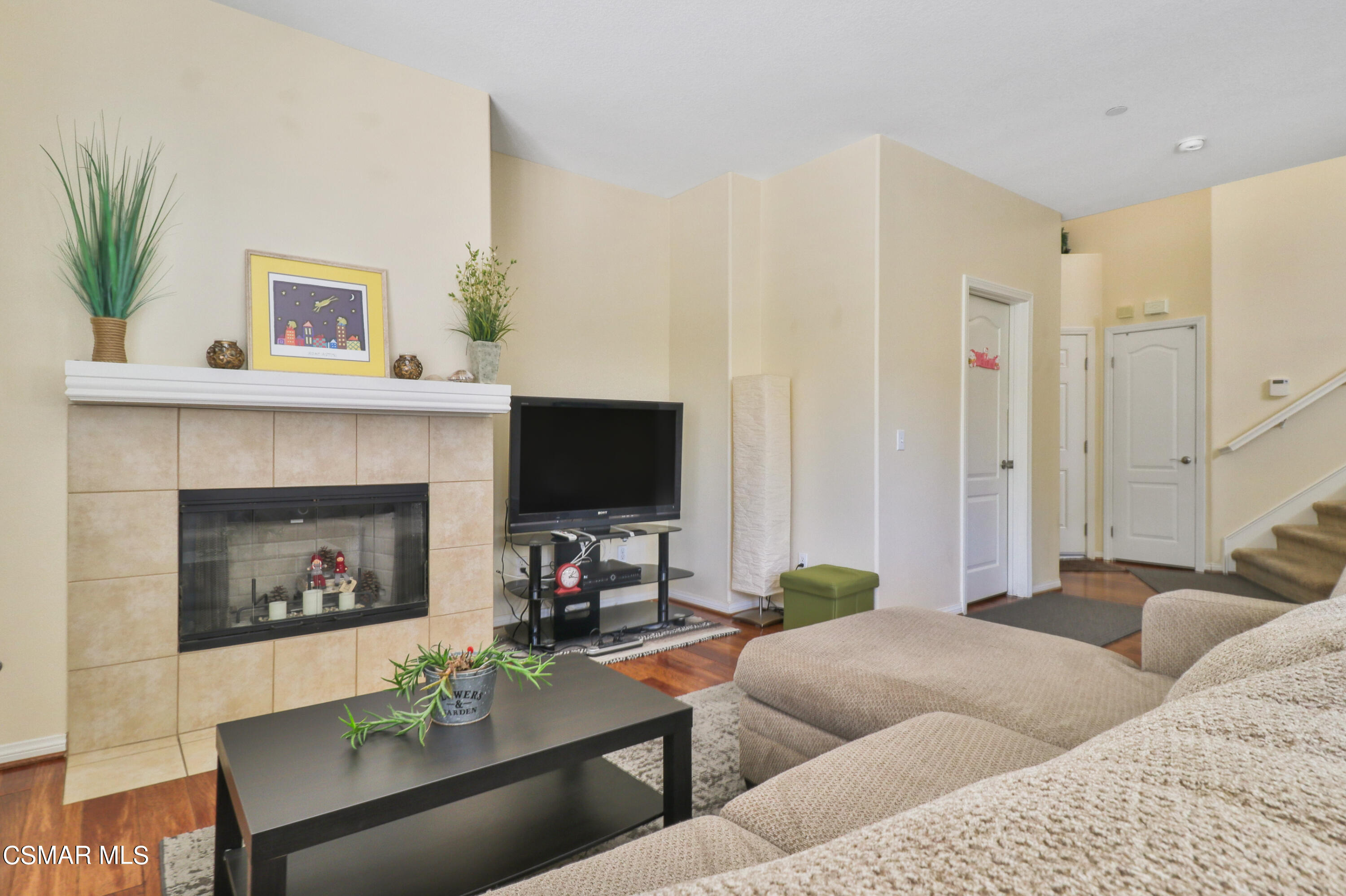 5281 Davidson Drive Oxnard, CA 93033 - Photo 12 of 38 a living room with furniture and a fireplace