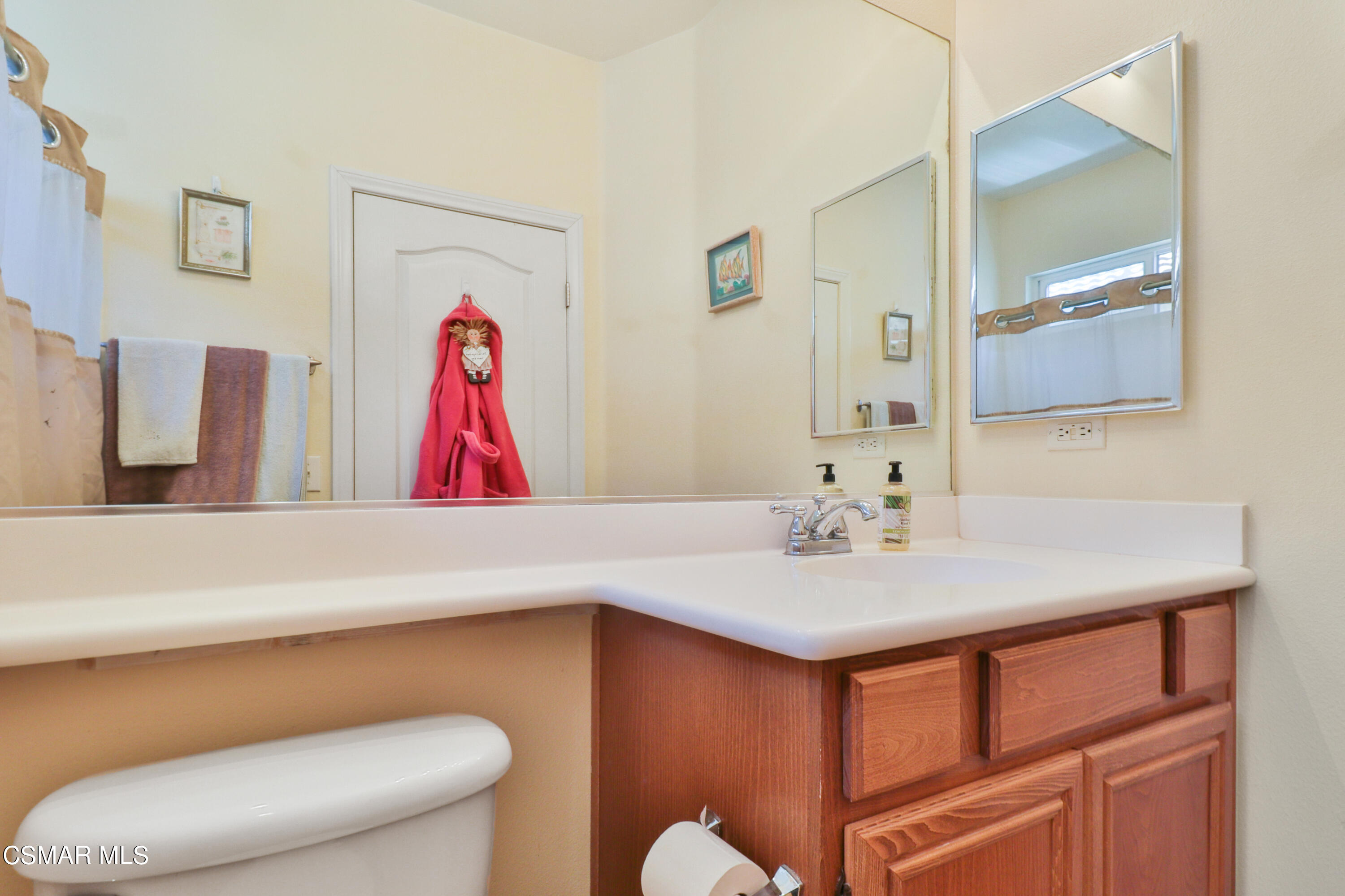 5281 Davidson Drive Oxnard, CA 93033 - Photo 33 of 38 a bathroom with a sink a toilet and a shower