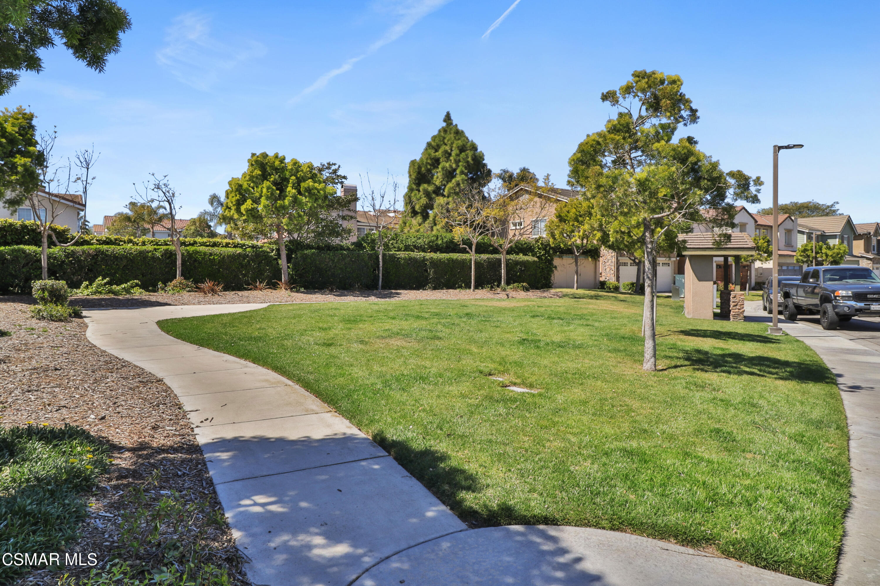 5281 Davidson Drive Oxnard, CA 93033 - Photo 38 of 38 a swimming pool with tall trees