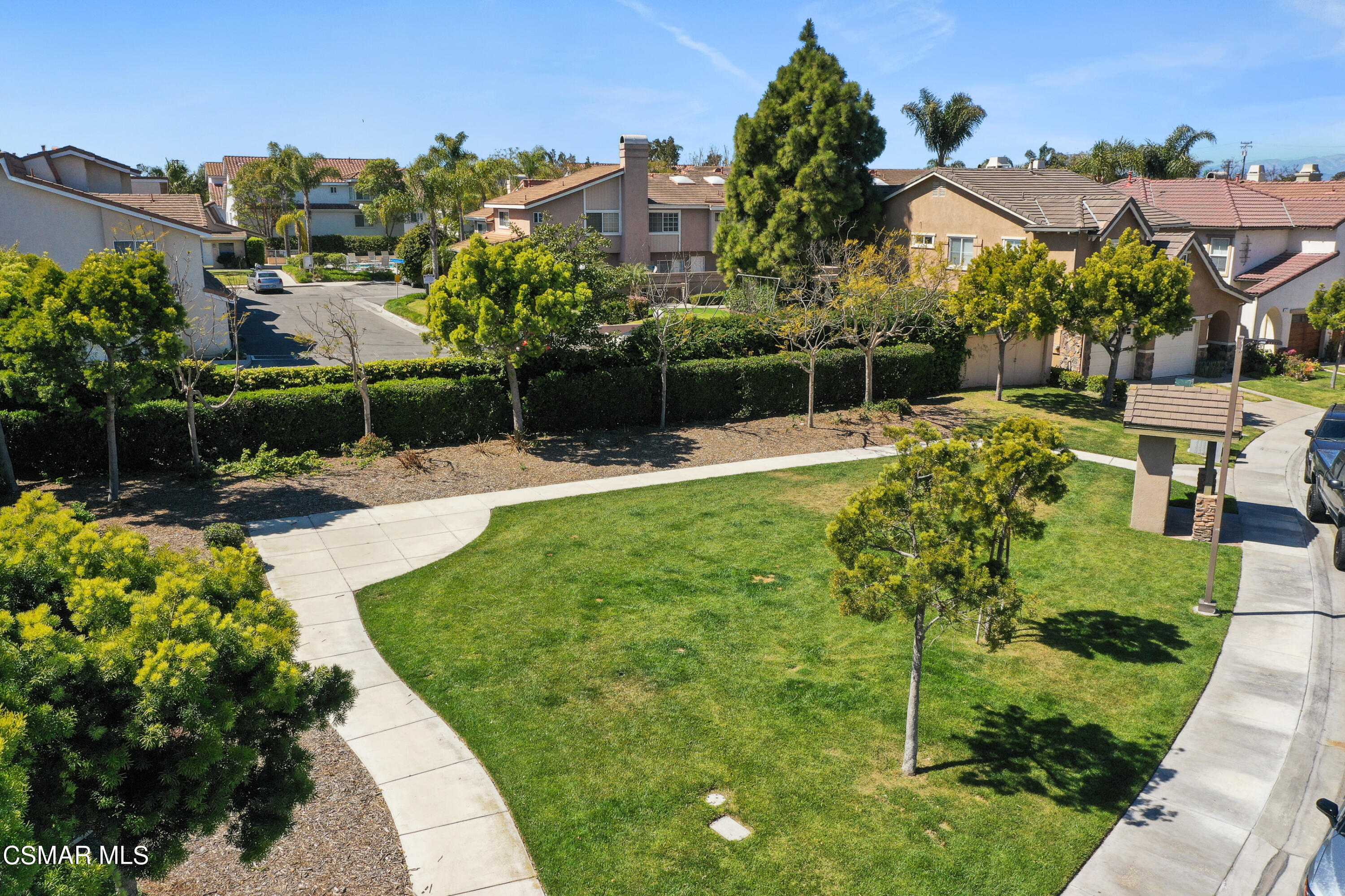 5281 Davidson Drive Oxnard, CA 93033 - Photo 5 of 38 a view of a garden with a building in the background