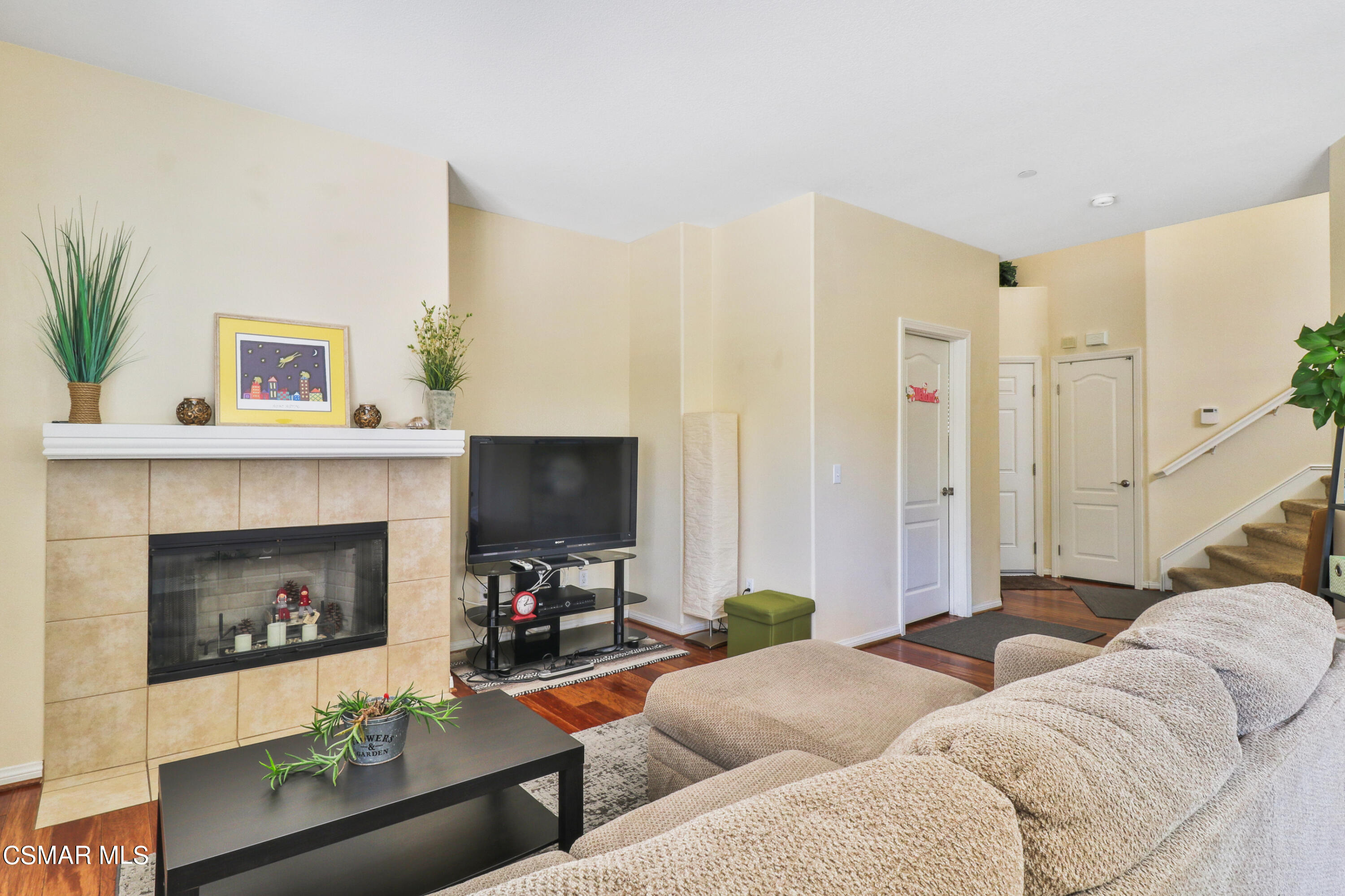 5281 Davidson Drive Oxnard, CA 93033 - Photo 9 of 38 a living room with furniture and a fireplace