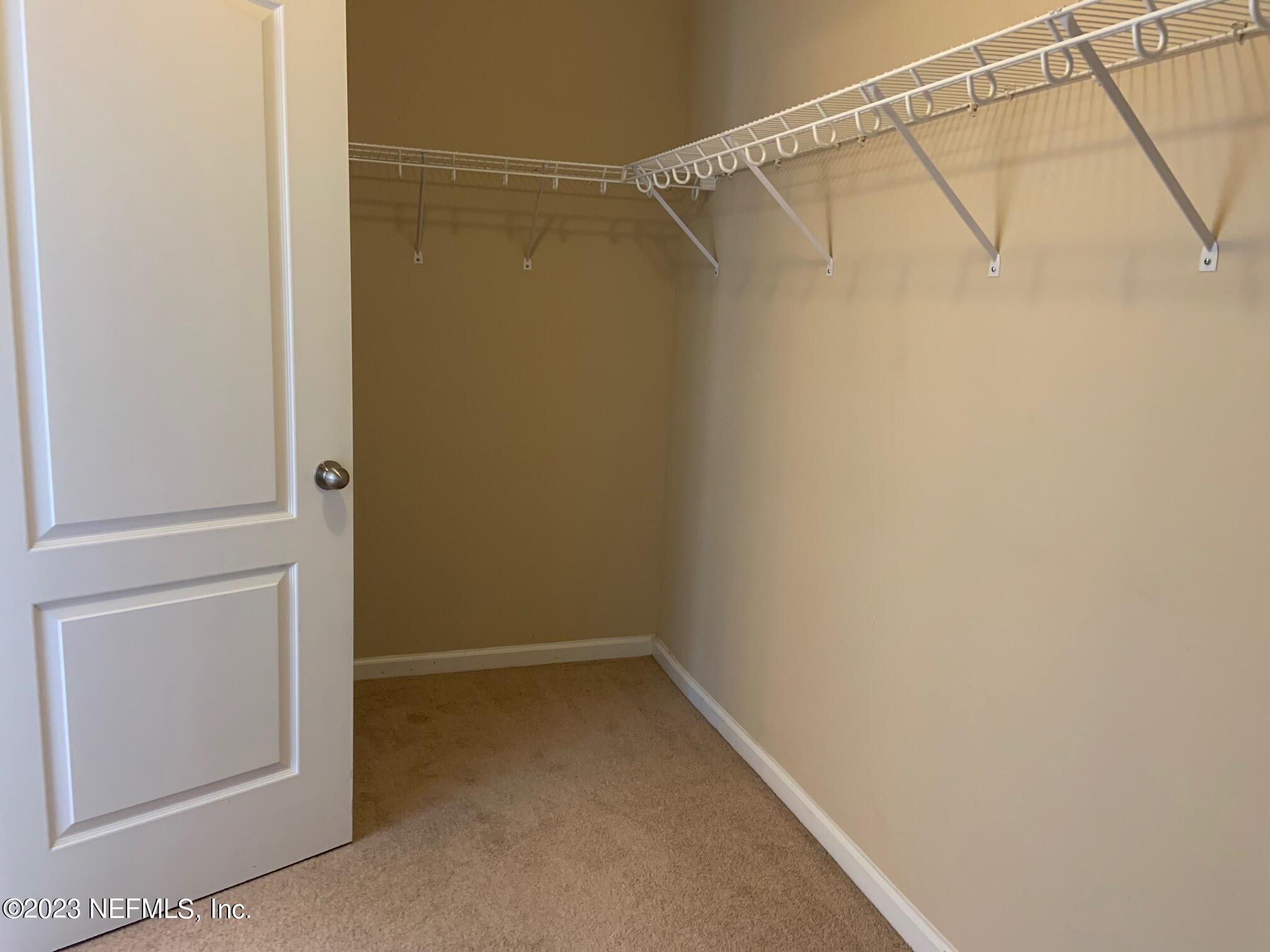 3863 Chasing Falls Road Orange Park, FL 32065 - Photo 25 of 32 a view of an empty walk in closet